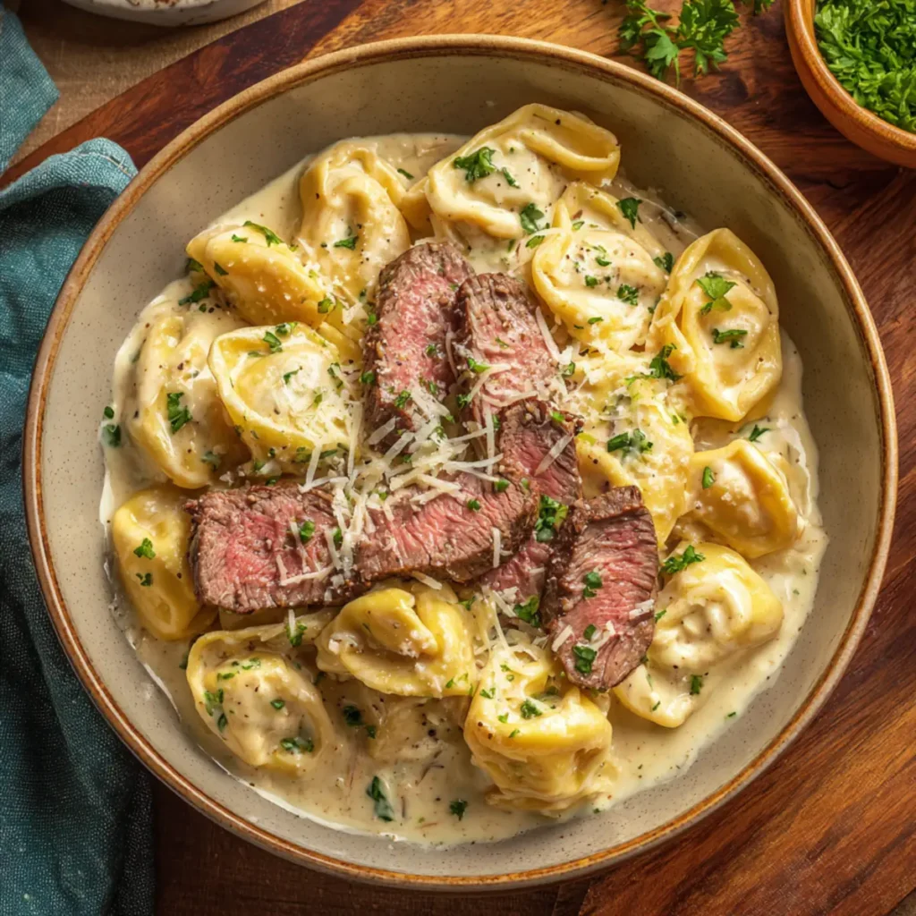 Steak and cheese tortellini in garlic cream sauce